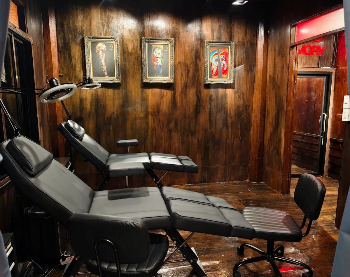 Gallery 1, a private tattoo room in lamplight